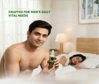Man holding a bottle of product with text 'Crafted for men's daily vital needs' in a bedroom.